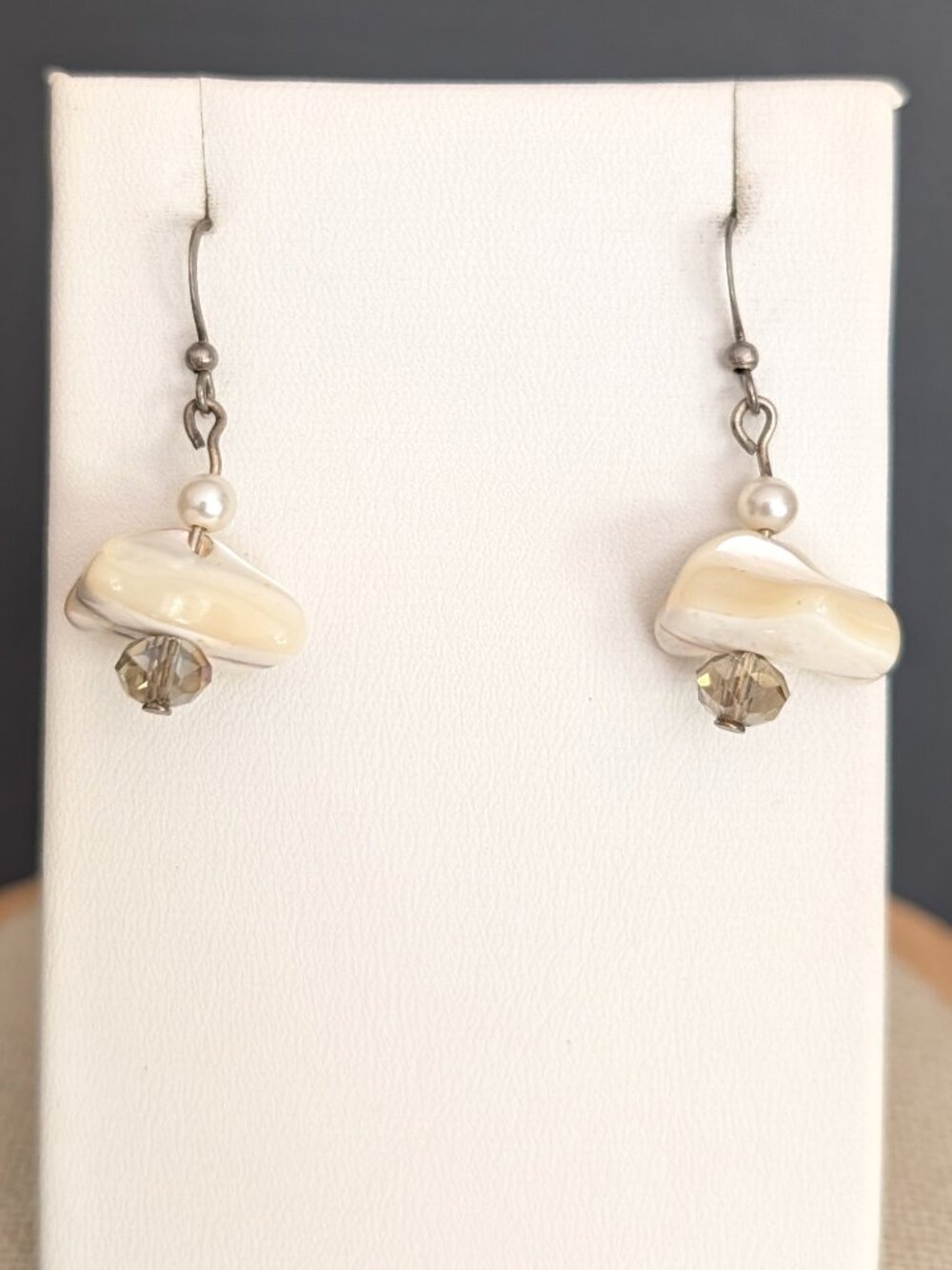 Polished shell, faux pearl and smoke crystal bead earrings